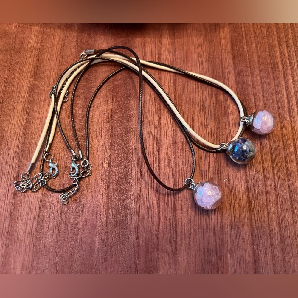 Hand filled glass globe pendants with assorted crystal chips. Set of 3.